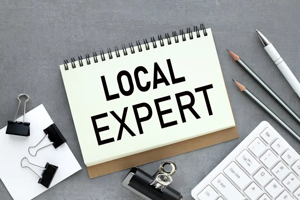 blank notepad with local expert in writing